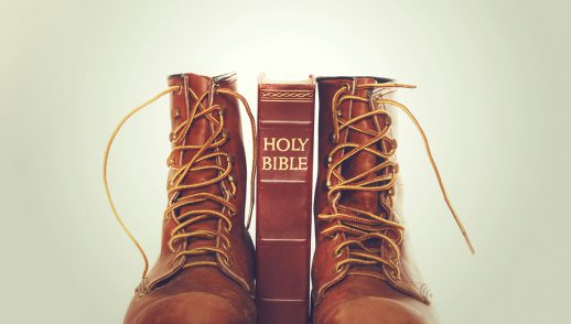 bible standing between work boots
