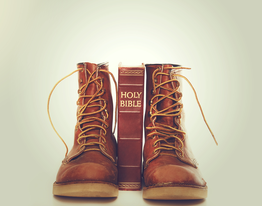 bible standing between work boots