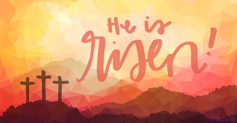 Sunrise over three crosses with the truth: He is Risen