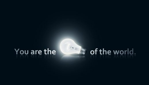 a brightly lit electric bulb against a dark background