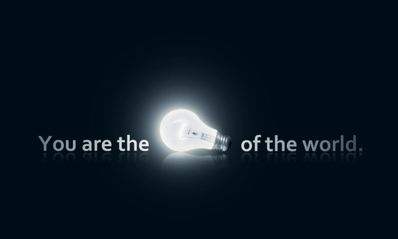 a brightly lit electric bulb against a dark background